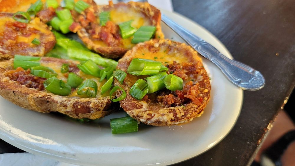 B.D. Riley's Irish Pub at Mueller - pic by James F. - Fried potato skins with bacon and chives.